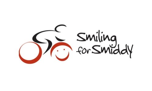 Logo with a stylised cyclist, where the front wheel is a red smiley face. Text to the right reads "smiling for smiddy" in a playful, handwritten font, supporting the Leukaemia Foundation. The design uses black and red on a white background.