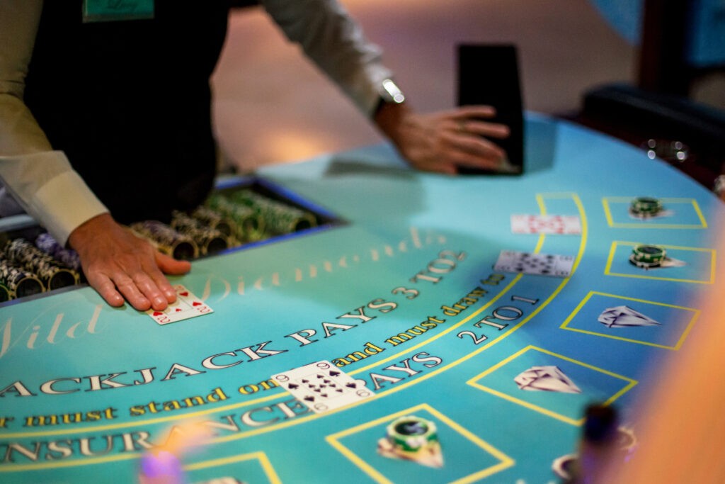 Professional blackjack dealer at Wild Diamonds Fun Casino Brisbane event - Expert card dealing and casino gaming for Sunshine Coast and Brisbane parties and corporate functions