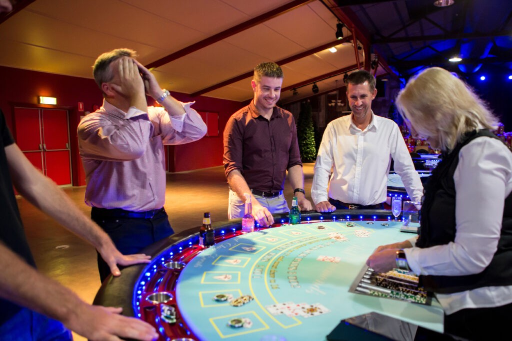 Guests enjoying blackjack gaming at Wild Diamonds Fun Casino Brisbane event - Authentic casino emotions and entertainment for Sunshine Coast and Brisbane parties