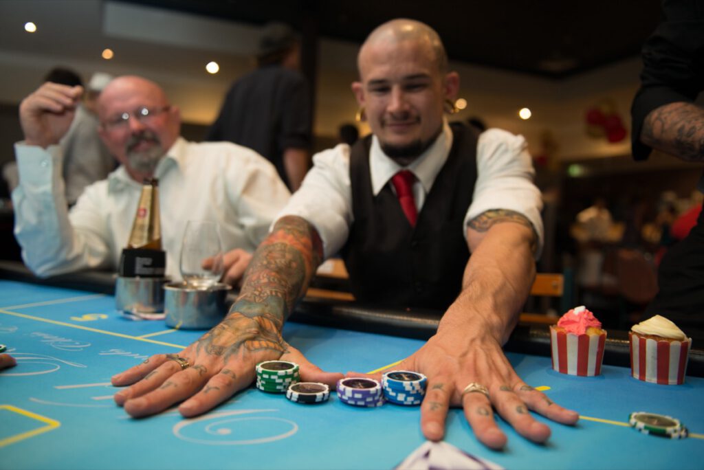 Wild Diamonds Fun Casino dealer hosting gaming at Brisbane event - Professional casino entertainment for Sunshine Coast corporate functions and private parties with authentic tables